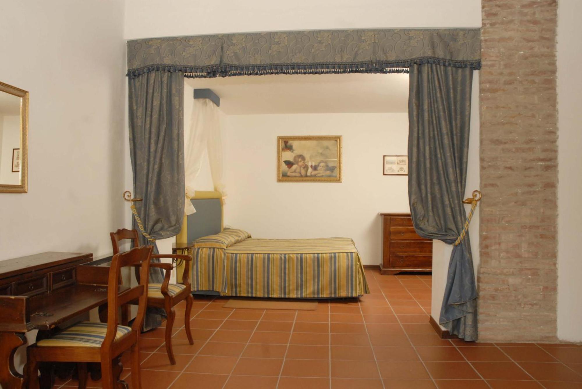 Гостьовий будинок Relais Borgo Di Toiano Совічілле Номер фото